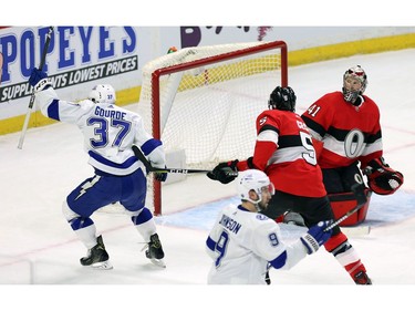 Tampa Bay Lightning centre Yanni Gourde (37) celebrates as he scores on Ottawa Senators goaltender Craig Anderson.