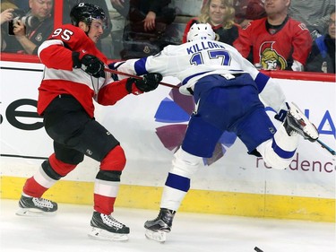 Ottawa Senators centre Matt Duchene (95) and Tampa Bay Lightning left wing Alex Killorn (17) fight for the puck.