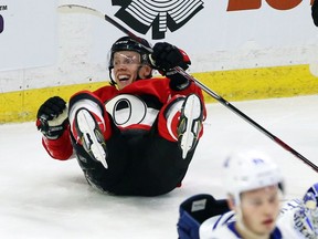 Senators winger Ryan Dzingel celebrates his third-period goal against the Lightning from the seat of his hockey pants in the third period on Saturday night.
