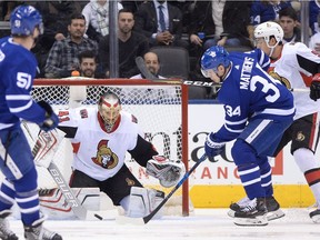 Senators goaltender Craig Anderson makes a save on Maple Leafs centre Auston Matthews (34) during the Jan. 10 game at Toronto.