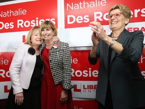 Nathalie Des Rosiers (M) celebrates her Vanier by-election with Madeleine Meilleur (L) and Kathleen Wynn in November 2016.