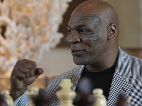 Mike Tyson makes a fist during an interview in Dubai, United Arab Emirates, on May 4, 2017.