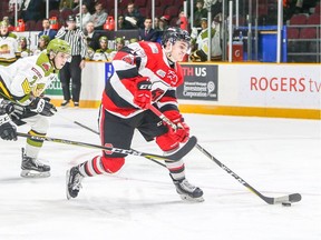 67's forward Mitchell Hoelscher (17) prepares to shoot the puck while being pursued by the Battalion's Simon Rose (7) during the first period. Valerie Wutti/Blitzen Photography/OSEG