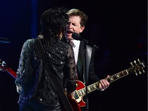 Michael J. Fox, right, performs onstage with Joan Jett during the Governor General's Performing Arts Awards gala at Rideau Hall in Ottawa on Thursday, June 29, 2017.