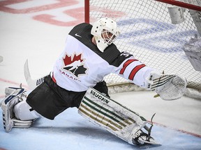 Canada's goaltender Ben Scrivens allows a goal during the Channel One Cup against Moscow on December 16, 2017.