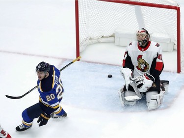 St. Louis Blues' Alexander Steen (20) celebrates after teammate Vladimir Sobotka scored against Ottawa Senators goaltender Craig Anderson, right, during the first period of an NHL hockey game Tuesday, Jan. 23, 2018, in St. Louis.