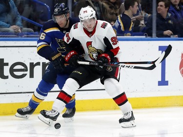 Ottawa Senators' Matt Duchene, right, and St. Louis Blues' Paul Stastny chase the puck during the second period of an NHL hockey game Tuesday, Jan. 23, 2018, in St. Louis.