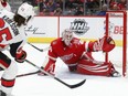 Erik Karlsson almost played the hero late in the third period against goalie Jimmy Howard and the Detroit Red Wings, but a few minutes later he was the goat in overtime.