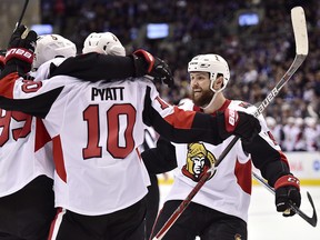 Ottawa Senators left wing Tom Pyatt (10) celebrates his goal with left wing Zack Smith (15) and centre Matt Duchene (obscured) during NHL action against the Maple Leafs in Toronto on Wednesday, January 10, 2018. (THE CANADIAN PRESS/Frank Gunn)
