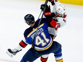St. Louis Blues' Robert Bortuzzo and Ottawa Senators' Zack Smith collide during the second period of an NHL game on Jan. 23, 2018