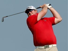 Brad Fritsch hits a tee shot in the third round of a Web.Com Tour event in Colombia in 2015.   Matthew Stockman/Getty Images/AFP