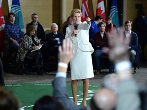 Ontario Premier Kathleen Wynne takes questions during a town hall meeting in Ottawa on Thursday, Jan. 18, 2018.