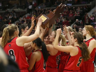 The Carleton women's team is 19-0 this season after raising the winners' trophy following Friday's vcitory against the Gee-Gees. Jana Chytilova/Postmedia