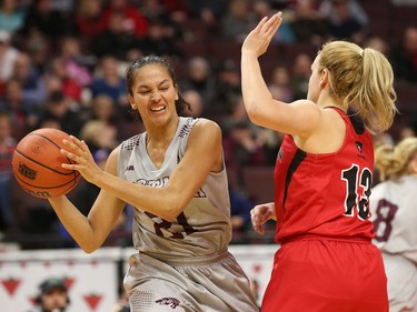 Carleton's Nicole Gilmore defends against Ottawa's Brigitte Lefebvre-Okankwu. Jana Chytilova/Postmedia