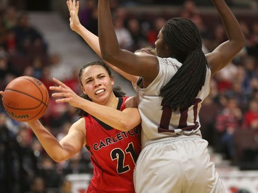 Carleton's Elizabeth Leblanc tries to get the ball past Ottawa's Adonaelle Mousamboté. Jana Chytilova/Postmedia