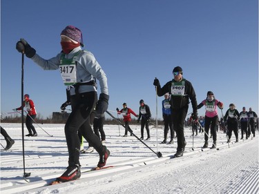 Skiers take part in the Gatineau Loppet 27K classic cross-country ski race on Saturday. Patrick Doyle/Postmedia