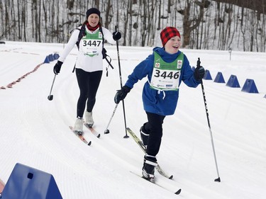Charlie Ruff and Kate Ruff take part in the Gatineau Loppet 27K classic race on Saturday. Patrick Doyle/Postmedia