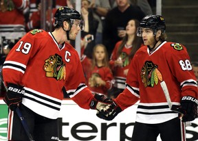 The contracts of Chicago Blackhawks' Jonathan Toews (left) and Patrick Kane have put the team in a bind. (AP PHOTO)
