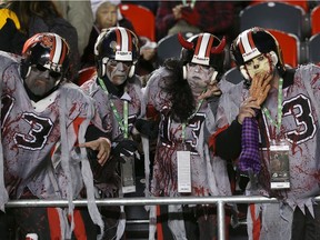 Fans dressed as zombies get into the party spirit before a Halloween Night Redblacks game against the Tiger-Cats in 2014.