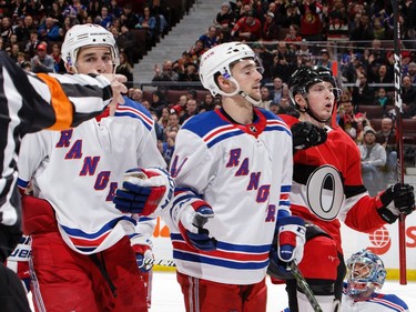 Matt Duchene of the Ottawa Senators celebrates his second-period goal as Brady Skjei and Neal Pionk (44) of the New York Rangers react.