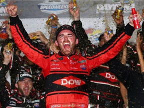 Austin Dillon celebrates in Victory Lane after winning the Monster Energy NASCAR Cup Series 60th Annual Daytona 500 at Daytona International Speedway on Sunday.