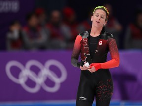 Canada's Ivanie Blondin tries to catch her breath after racing in the women's 3,000m at the Pyeongchang Olympics on Feb. 10.