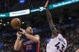 Detroit Pistons forward Blake Griffin (left) tries to shoot on Toronto Raptors' Pascal Siakam during second half NBA basketball action in Toronto on Monday, February 26, 2018. THE CANADIAN PRESS