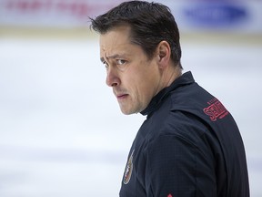 Ottawa Senator head coach Guy Boucher watches his team during practice on Feb 6, 2018. (Wayne Cuddington/ Postmedia)