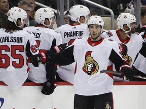 Ottawa Senators' Derick Brassard (19) celebrates his goal as he returns to the bench against the Pittsburgh Penguins in Pittsburgh, Tuesday, Feb. 13, 2018. (AP Photo/Gene J. Puskar)