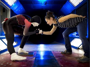 Researcher Annick D'Auteuil in an NRC wind tunnel with mannequin wearing a speedskating suit for 2018 PyeongChang Olympics.