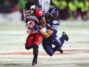 The most recent CFL game Rico Murray played in was in Ottawa. In this photo, he tackles the Stampeders' Roy Finch in the Grey Cup game that the Argonauts won at TD Place stadium on Nov. 26.