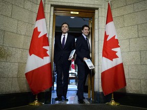 Gaston and Alphonse? Finance Minister Bill Morneau and Prime Minister Trudeau show off a budget that clearly does not impress some Sun readers.