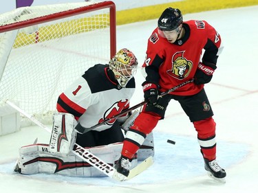 Ottawa Senators Jean-Gabriel Pageau(44) screens New Jersey Devils goaltender Keith Kinkaid(1) on a goal by Senators Christopher DiDomenico (not shown) during first period NHL action in Ottawa, Tuesday, February 6, 2018.