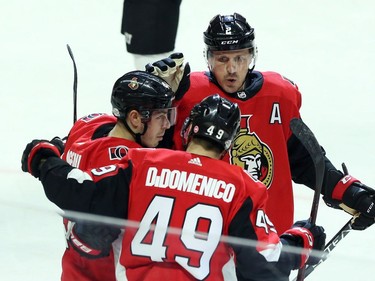 Ottawa Senators Christopher DiDomenico (49) celebrates his goal with teammates Jean-Gabriel Pageau (44) and Dion Phaneuf (2) during first period NHL action against the New Jersey Devils in Ottawa, Tuesday, February 6, 2018.