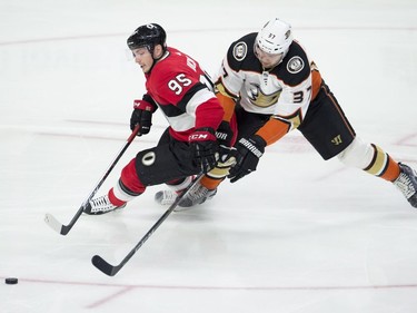 Ottawa Senators centre Matt Duchene battles for control of the puck with Anaheim Ducks left wing Nick Ritchie during the first period NHL action, Thursday, February 1, 2018 in Ottawa.