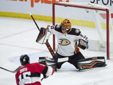 Ottawa Senators left wing Zack Smith puts a shot off the crossbar over the shoulder of Anaheim Ducks goaltender Ryan Miller during second period NHL action, Thursday, February 1, 2018 in Ottawa.