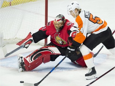 Ottawa Senators goaltender Craig Anderson stretches across the crease to block a shot from the Philadelphia Flyers' Oskar Lindblom during the second period at the CTC on Saturday, Feb. 24, 2018.