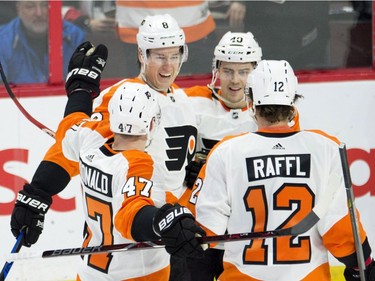 Philadelphia Flyers defenceman Robert Hagg (#8) celebrates his goal with teammates Andrew MacDonald(#47), Jordan Weal (#40) and Michael Raffl (#12) during first period NHL action Saturday February 24, 2018 in Ottawa. The Flyers defeated the Senators 5-3.