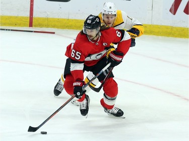 Ottawa Senators Erik Karlsson (65) is chased by Nashville Predators Kyle Turris (8) during first period NHL action in Ottawa, Thursday, February 8, 2018.