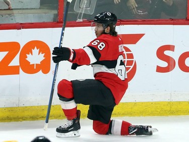 The Senators' Mike Hoffman celebrates his winning overtime goal against the Nashville Predators during NHL action in Ottawa on Thursday, Feb. 8, 2018 .