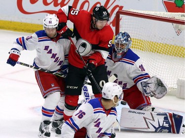 Senators centre Matt Duchene (95) tips the puck past Rangers netminder Henrik Lundqvist for a goal in the second period.