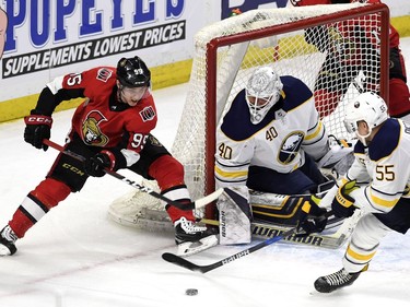 The Ottawa Senators' Matt Duchene tries to wrap the puck around the net of Buffalo Sabres goaltender Robin Lehner as Rasmus Ristolainen defends during the first period at the CTC on Thursday, Feb. 15, 2018.