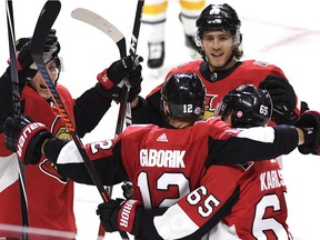 Marian Gaborik, one of the two new Senators, celebrates with Erik Karlsson (65), Matt Duchene (95) and Mike Hoffman (68) after scoring in his first game with Ottawa.