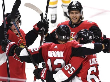 Marian Gaborik, one of the two new Ottawa Senators, celebrates his goal against the Buffalo Sabres with Erik Karlsson (65), Matt Duchene (95) and Mike Hoffman (68).