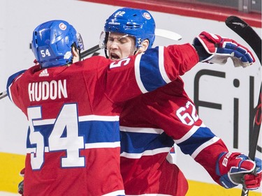 Montreal Canadiens left wing Artturi Lehkonen (62) celebrates with teammate left wing Charles Hudon (54) after scoring against the Ottawa Senators during second period NHL hockey action in Montreal, Sunday, February 4, 2018.