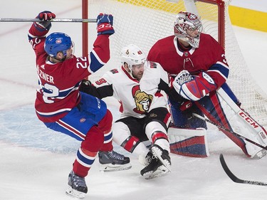 Ottawa Senators left wing Christopher DiDomenico (49) is sandwiched between Montreal Canadiens goaltender Carey Price (31) and defenceman Karl Alzner (22) during first period NHL hockey action in Montreal, Sunday, February 4, 2018.