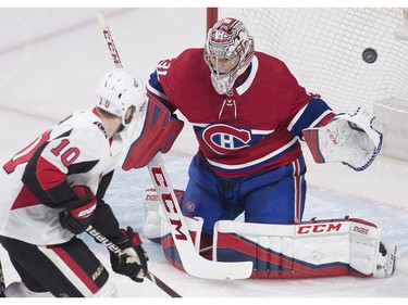 Ottawa Senators left wing Tom Pyatt (10) takes a shot on Montreal Canadiens goaltender Carey Price (31) during first period NHL hockey action in Montreal, Sunday, February 4, 2018.