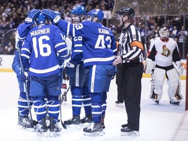 Celebrating the Leafs' second period goal, left to right, Morgan Rielly, Mitchell Marner, James van Riemsdyk and Nazem Kadri. THE CANADIAN PRESS/Chris Young