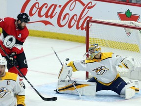 Ottawa Senators Zack Smith waits for a rebound off of Nashville Predators goaltender Juuse Saros(74) during second period NHL action in Ottawa, Thursday, February 8, 2018 . THE CANADIAN PRESS