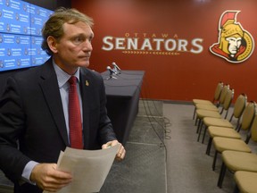 Ottawa Senators former team president Cyril Leeder leaves a news conference in 2015, one day after being relieved of his duties as president and CEO of the Ottawa Senators.